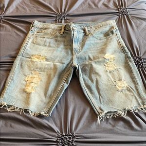 511 slim distressed jean shorts